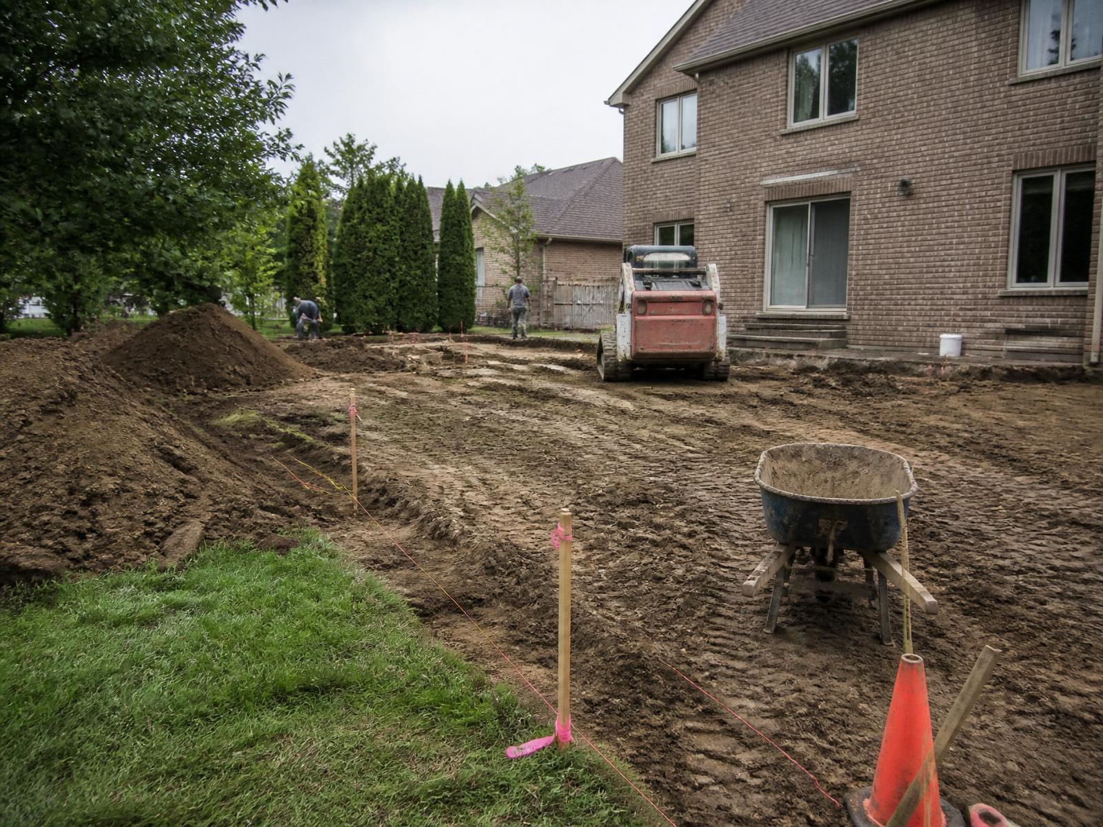 Early excavation and grading at a Zionsville residential landscape project